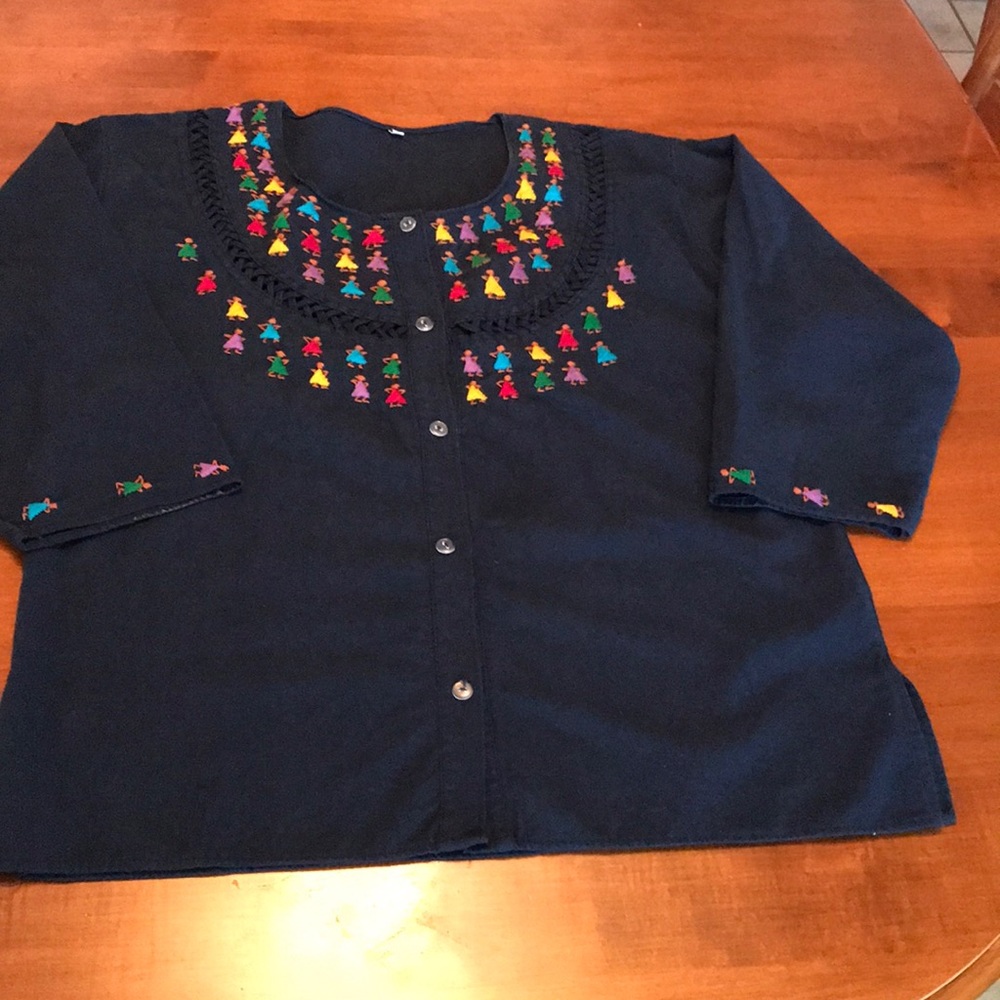 Embroidered top size Medium loose fitting with embroidery neck/bodice & sleeves